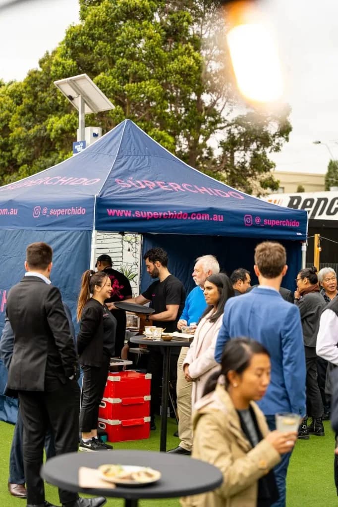 Superchido branded marquee catering tacos and cocktails at an outdoor special event in Seddon